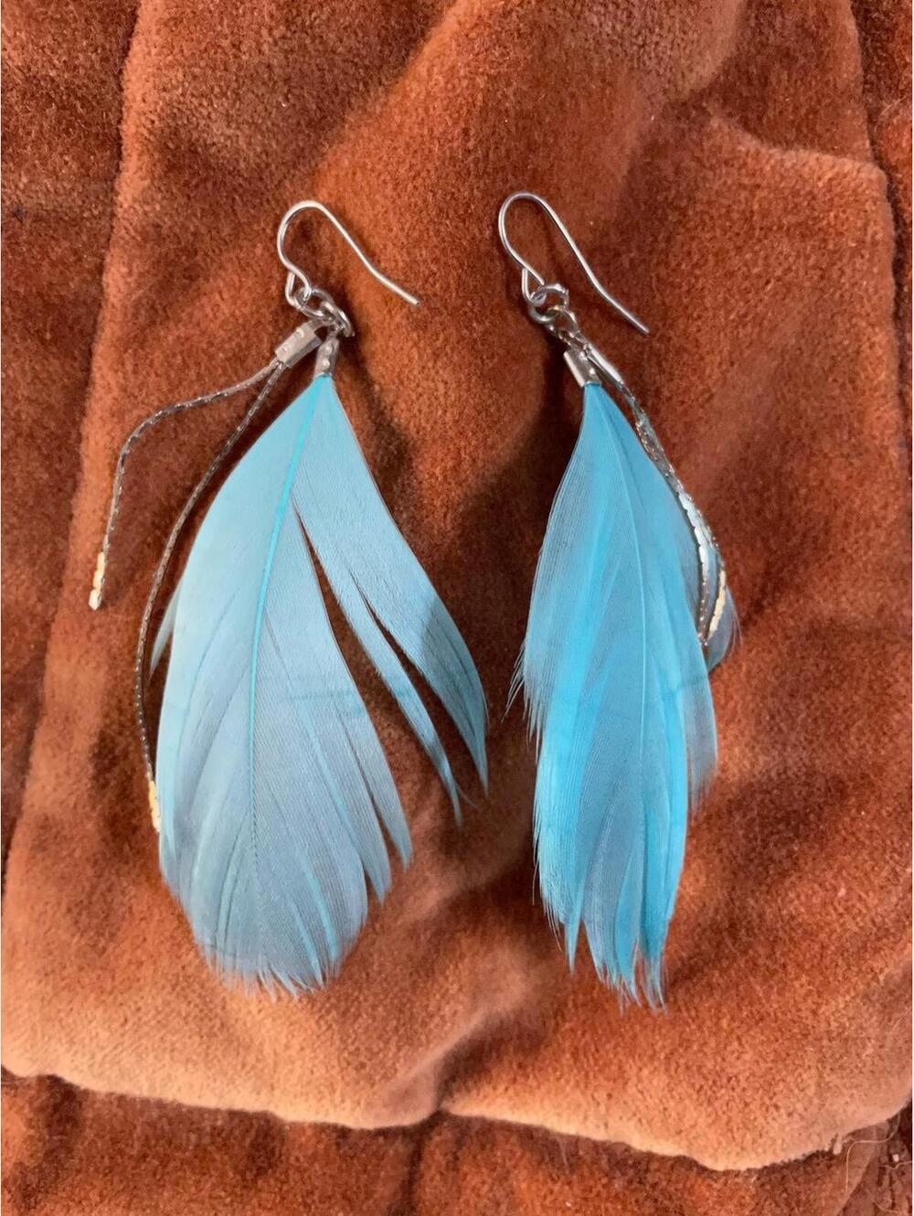Target baby blue feather ear rings